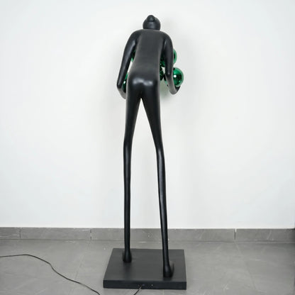 Glow figure lamp, green orbs, rear studio