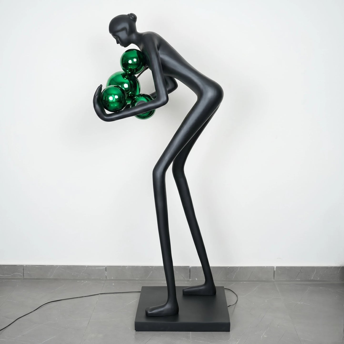 Glow figure lamp, emerald orbs, side studio