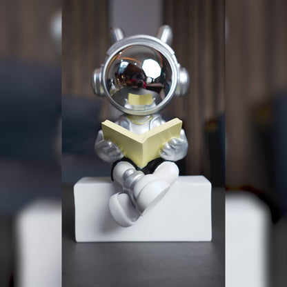 Cosmic Reader Figurine- Silver