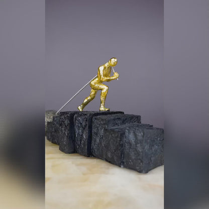 Struggle & Strength Resin Sculpture - Golden