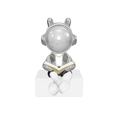 Cosmic Reader Figurine- Silver
