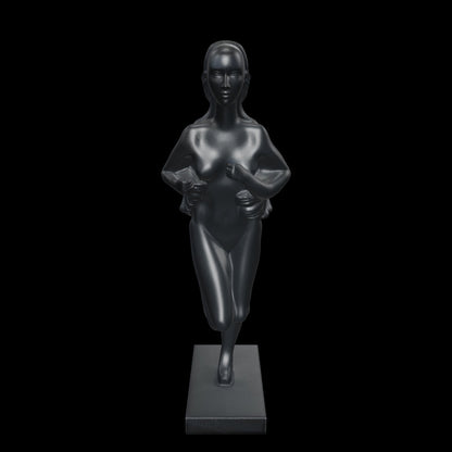Premium matte black abstract human figurine featuring an illusion of movement and artistic craftsmanship for luxury homes, offices and modern designer interiors.