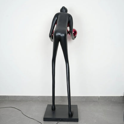 Glow figure lamp, red orbs, rear studio shot