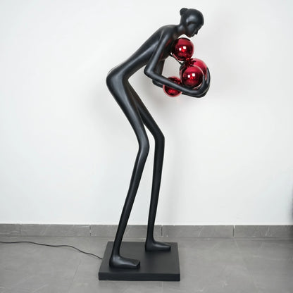 Glow figure lamp, crimson orbs, 3/4 view